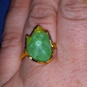 Size 9 gold tone ring with green stone